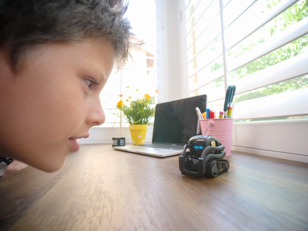 Kid with an AI Robot